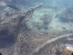 MS underwater view of 2004 tsunami debris, Thailand Stock Footage