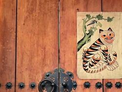 MS Tiger painting on door of Traditional Korean House / Seoul, South Korea Stock Footage