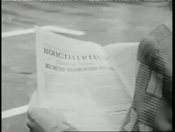 Citizens of the USSR read newspapers in the pouring rain. News Clip