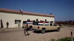 CLEAN : Iraqi fighters patrol after IS attack near Abu Ghraib News Clip
