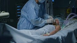 DS Surgeon preparing mechanical ventilation for child patient Stock Footage