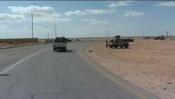 Rebels on outskirts of Ajdabiya after shelling by Gadhafi forces Instructional Video