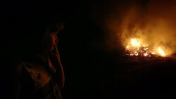 Child Looking at Big Fire Stock Footage