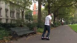 Man Using Mini Segway Board News Clip