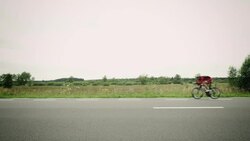 Man riding racing bike Stock Footage