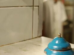 MS R/F PAN Cook/Chef preparing a prawn tempura dish, typical Japanese food final dish and someone ringing the bell to show it / Sao Paulo, Brazil Stock Footage