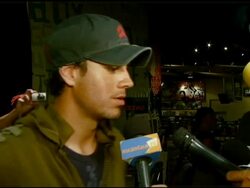 Enrique Iglesias Promotes Release of 'Insomniac' with Performance and Signing Stock Footage