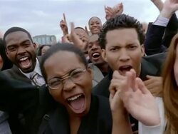 Slow motion medium shot pan crowd of smiling businesspeople cheering and clapping Stock Footage