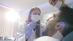 Young female dentist working Stock Footage