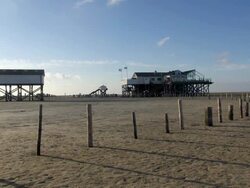 WS View of clouds moving over cafÃƒÂ© and restaurant, North Sea North Frisia, / St. Peter Ording, Schleswig Holstein, Germany Stock Footage