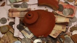 Piggy bank broken Stock Footage