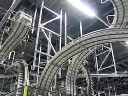 MS PAN Shot of conveyer belts at newspaper printing office / Russelheim, Hesse, Germany Stock Footage