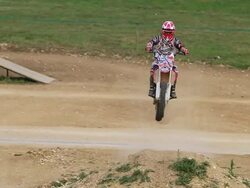 A man motocross motorcycle riding and doing a jumping trick. - Slow Motion Stock Footage