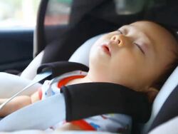 HD:Portrait of little baby  sleeping in safety carseat. Stock Footage