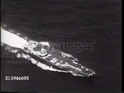 1965: USS ENTERPRISE (CVN-65): AERIAL USS Enterprise first nuclear-powered aircraft carrier in unidentified waters, HA TD WS USS Enterprise w/ A-4 Skyhawk fighter jets on flight deck, VS Flight deck w/ crews gathered for briefings. Instructional Video