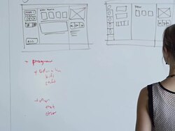 MS PAN businesswoman standing in front of white board in high tech office rear view Stock Footage