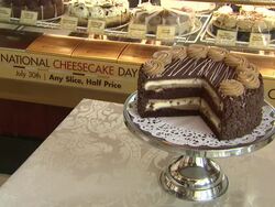 ATMOSPHERE: Reese's Peanut Butter Chocolate Cake Cheesecake at the American Idols Celebrate National Cheesecake Day at The Cheesecake Factory at Virginia Beach VA. (Footage by WireImage Video/GettyImages) Stock Footage