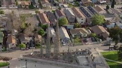 Aerial view tilting down over the famous Watts towers of South Los Angeles. The Towers are a local and national historic landmark. Stock Footage