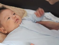 Baby playing with mother Stock Footage