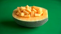cantaloupe melon on green Stock Footage