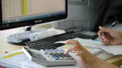 Female hand in Working Payroll workers. Calculation at office Stock Footage