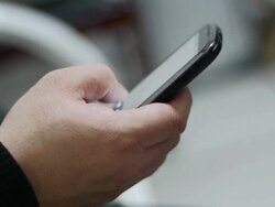Operating touch screen mobile phone. Stock Footage