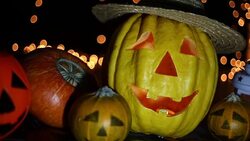 Halloween pumpkin head jack lantern on wooden background Stock Footage