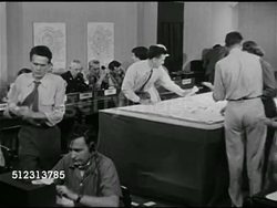 1951: WHAT-IF SCENARIO: SYRACUSE 'AFTER': INT Operations Center, people busy answering telephones, passing notes, city officials talking. 1950s Horror, 1950s Sci-fi, B Movie, Science fiction, The Red Scare, McCarthyism. Instructional Video