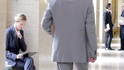 Lawyer using tablet computer in courthouse hallway Stock Footage