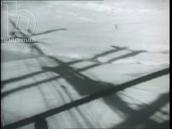 Greenland expedition, 1934, by French explorers - welcomed by eskimos in kayaks, eskimo family, man smokes pipe. Stock Footage