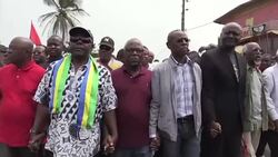 CLEAN : Gabon police charge at protesters beat AFP cameraman News Clip