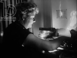 Women in filmmaking - editing and filming, c.1960 Stock Footage
