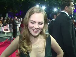 INTERVIEW - Alicia Von Rittberg on filming in England, working with Brad Pitt, the film subject at 'Fury' Closing Gala Stock Footage