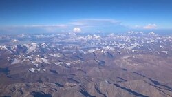 Aerial view of the Himalayas mountain range from the airplane window Stock Footage