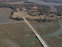 WS AERIAL View of town and traffic moving on highway / South Carolina, United States Stock Footage
