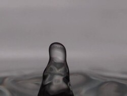 ECU SLO MO Shot of water drop into pool of water / New York, United States Stock Footage