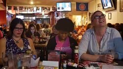 Debate viewers in Indiana react to Trump's Bad Hombres comment while watching on TV as Donald Trump and Hillary Clinton debate for the third and last time Stock Footage