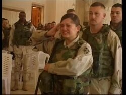 US troops mourning comrades narrowly miss bomb News Clip