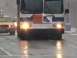 WS View of Traffic at Central Park West during snow / New York City, New York, USA Stock Footage