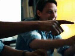 Friends on sofa playing Games Console Stock Footage