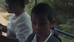 M/S Myanmar boy and mother in school bus Stock Footage