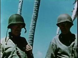 Removing ID tags from dead, Generals Holland Smith and Julian Smith walk together, Admiral Harry Hill with other officers. Stock Footage