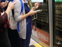 HD:Montage of unidentified passengers use mobile phones in subway. Stock Footage