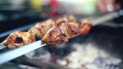 Barbecue with delicious grilled meat on grill. Stock Footage