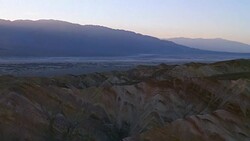 Death Valley National Park Aerial Fly-Over through Canyon Reveal of Death Valley Stock Footage
