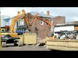 CLEAN: Workers in Christchurch tear down buildings damaged by the quake News Clip