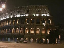 MS, Colosseum illuminated at night, Rome, Italy Stock Footage