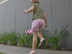 Patriotic Child: Dancing while Waving USA Flag Stock Footage