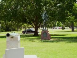 Bronze statue Hiker Spanish American War memorial in city park Stock Footage