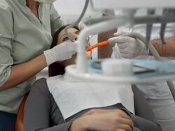 HD: Dentist Drilling A Woman's Tooth Stock Footage